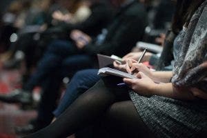 girl sitting in conference